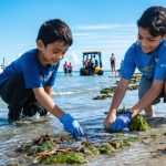 "Students and researchers at a coastal marine academy engage in hands-on educational and conservation activities, including tide pool analysis, ocean data collection, and beach clean-ups, illustrating the integration of research and education in marine conservation efforts."
